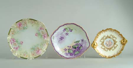 Appraisal: THREE HAND PAINTED FANCY PLATES - rose decorated plate marked