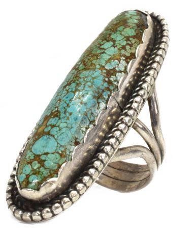 Appraisal: Native American silver content unknown ring oblong turquoise cabochon with