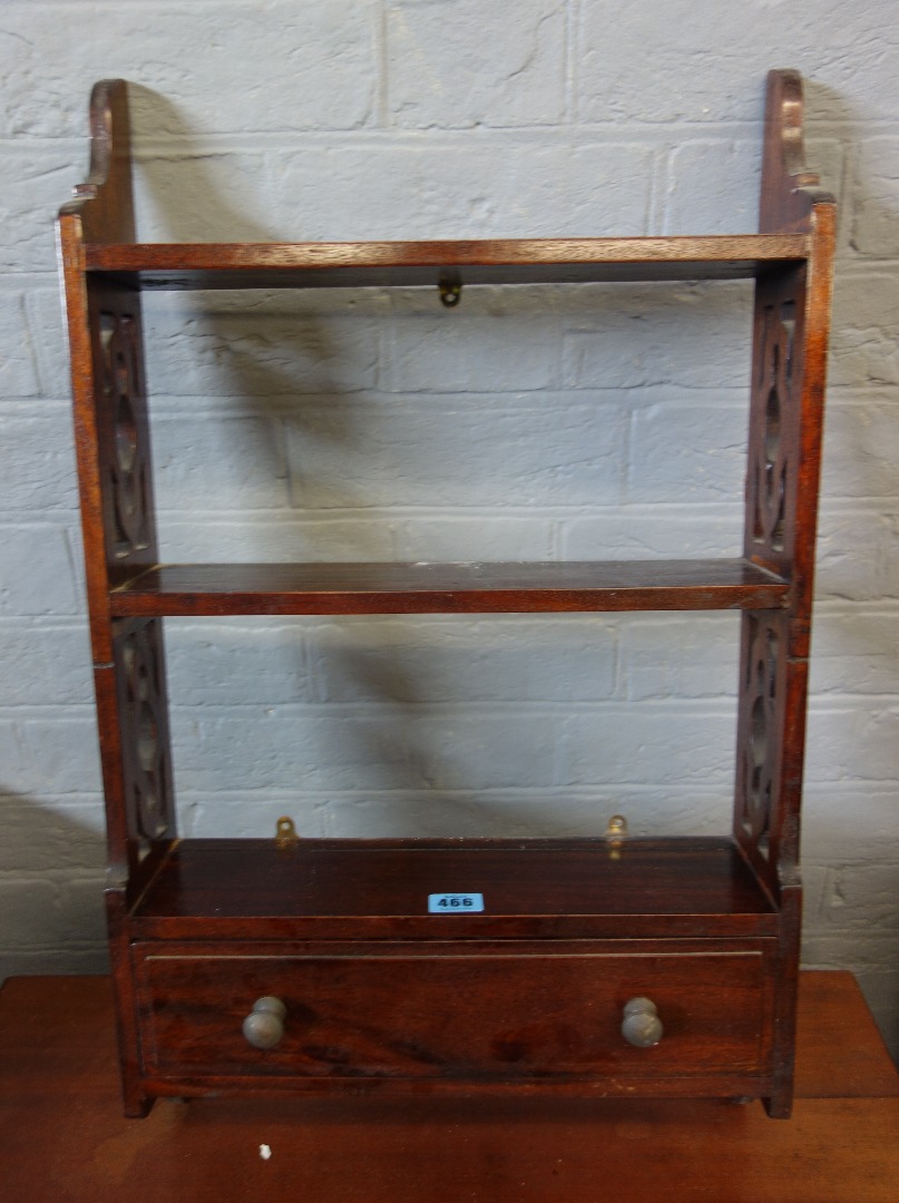 Appraisal: A set of reproduction mahogany wall hanging shelves with single