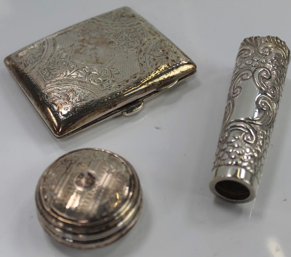 Appraisal: A chased silver cigarette case silver pill box and a