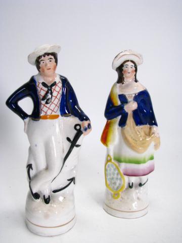 Appraisal: Two Staffordshire figurines including sailor and peasant girl