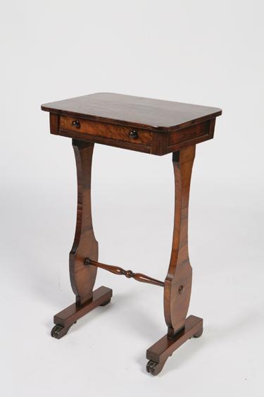 Appraisal: A REGENCY ROSEWOOD WORK TABLE the rectangular top with rounded