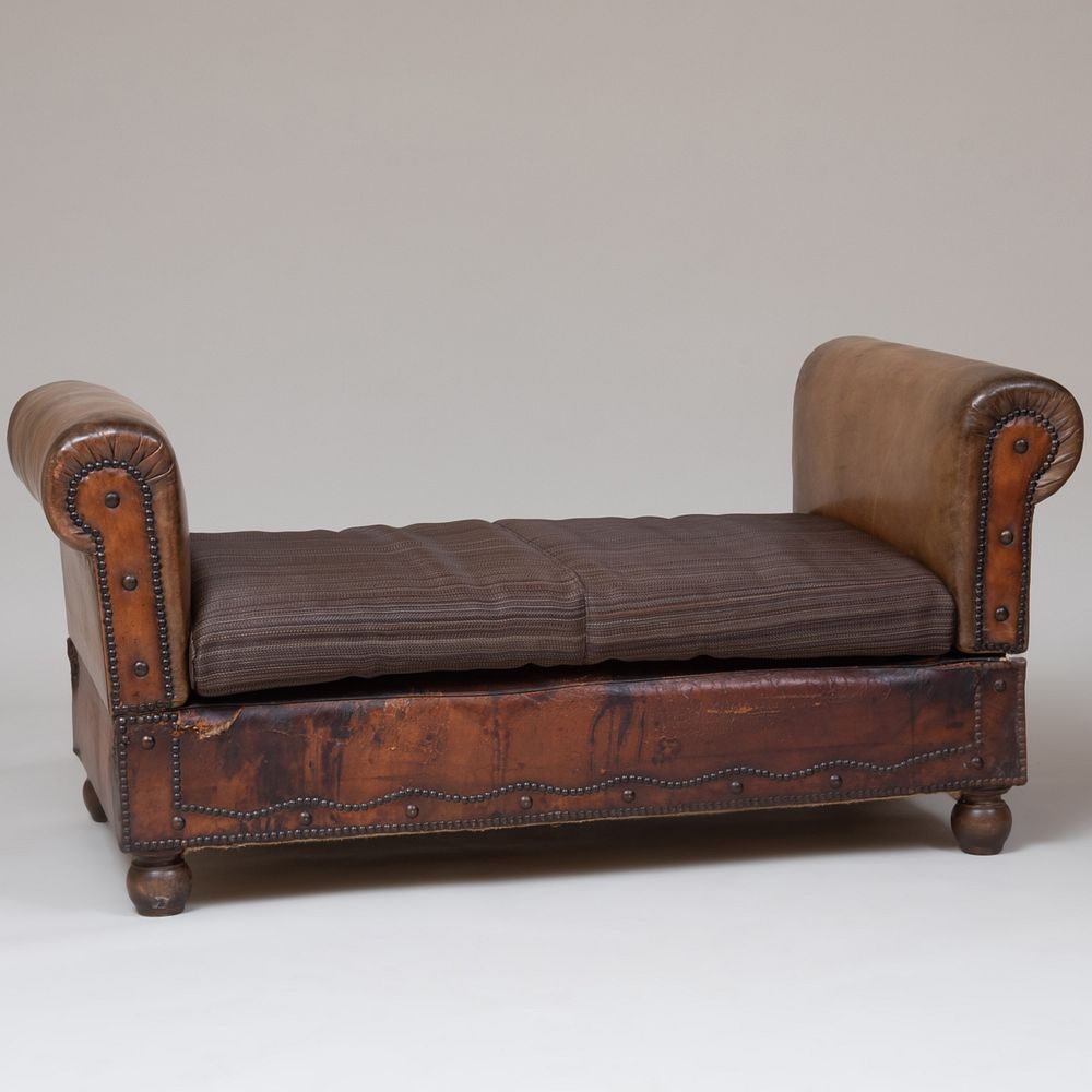 Appraisal: Victorian Brass-Studded Leather and Horsehair Metamorphic Day Bed The armrests