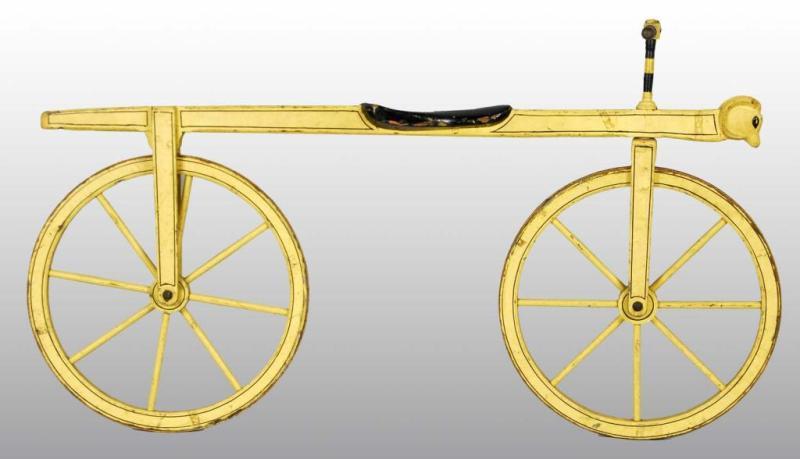 Appraisal: Large Wooden Bicycle Description Ram's head adorns front Original yellow