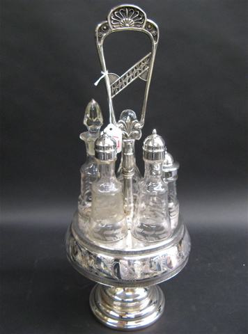 Appraisal: AMERICAN SILVER PLATED CASTOR SET Victorian having molded glass bottles