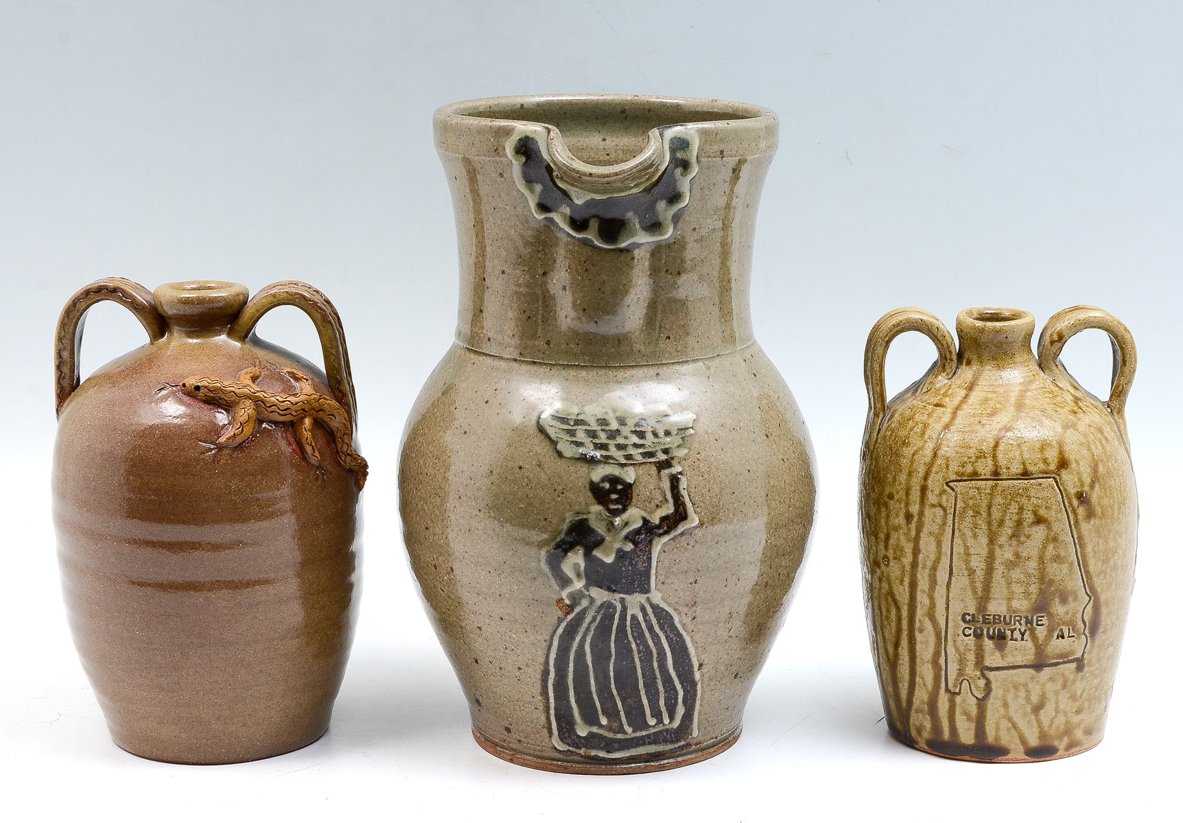 Appraisal: PC SOUTH CAROLINA FOLK ART POTTERY JUGS Comprising - Mike