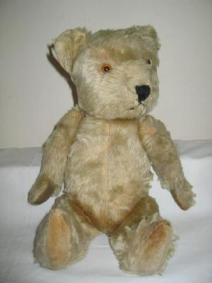 Appraisal: A Chiltern teddy bear covered in dark cream plush with