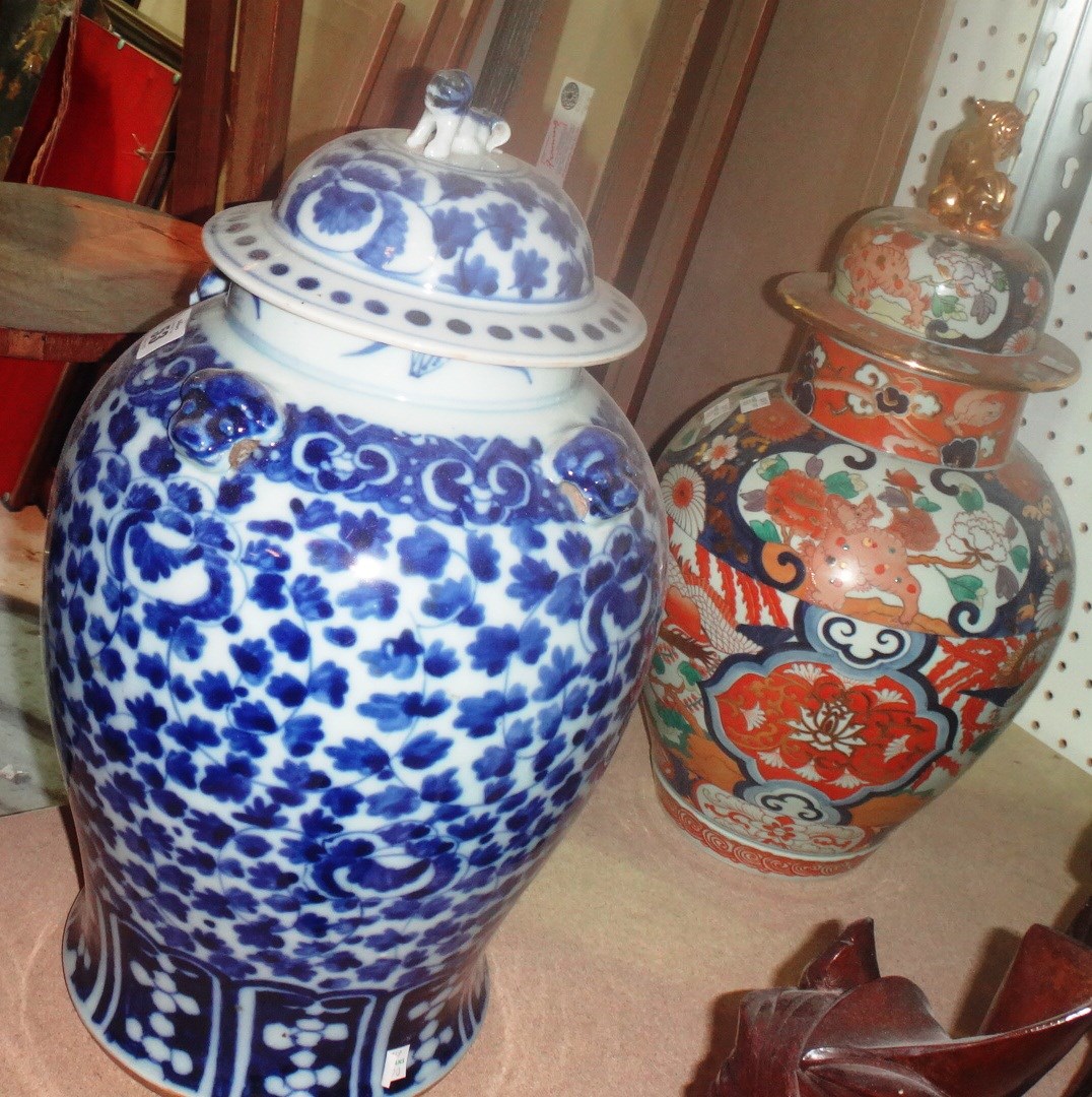 Appraisal: An Oriental blue and white baluster vase and cover and