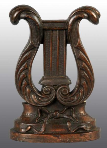 Appraisal: Cast Iron Lyre Musical Instrument Doorstop Description Made by Hubley