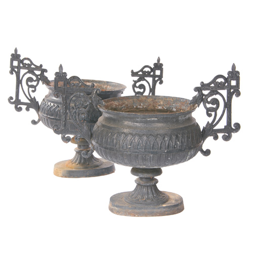 Appraisal: GARDENWARE Pair of cast-iron urns with square handles and leafy