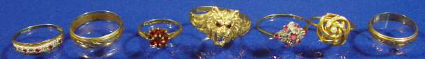 Appraisal: Assorted gold rings including wedding bands and tiger's head ring