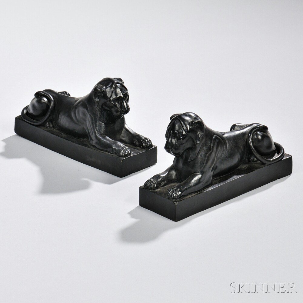 Appraisal: Pair of Wedgwood Black Basalt Lions England th century modeled