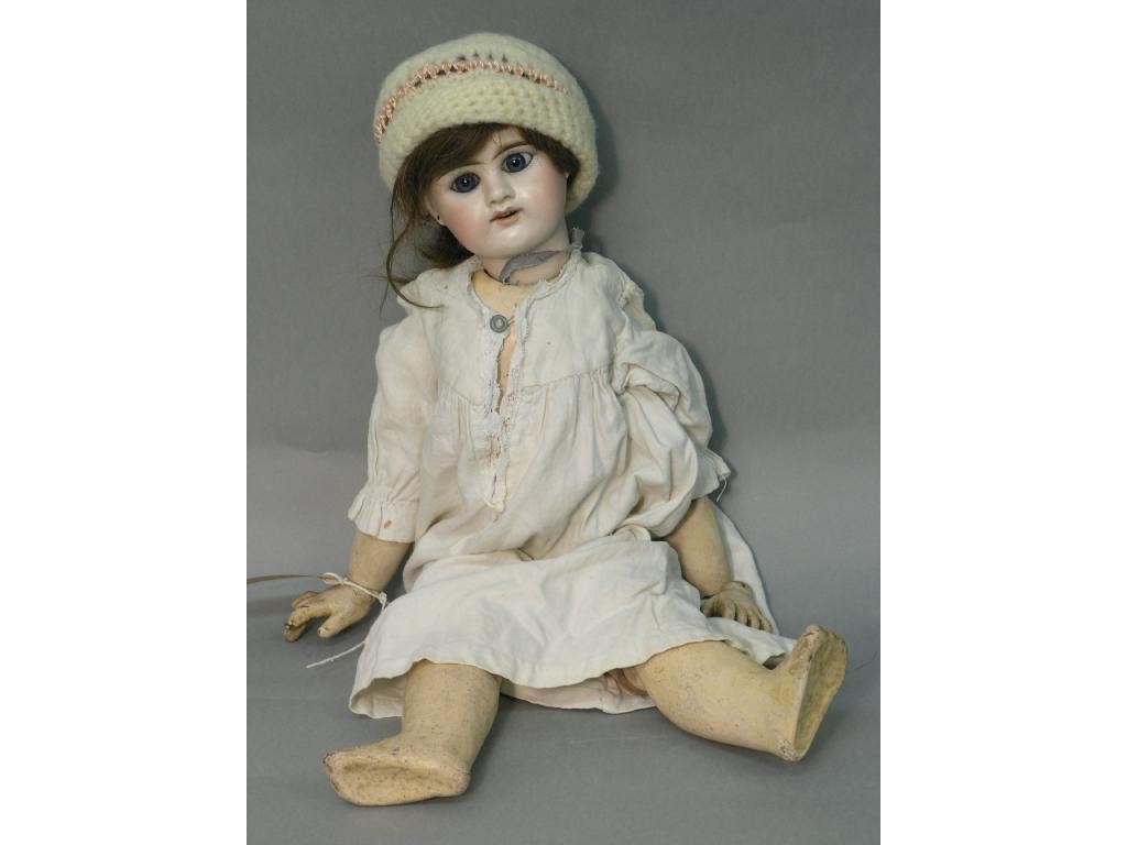 Appraisal: An early th Century bisque doll impressed ED Depose with