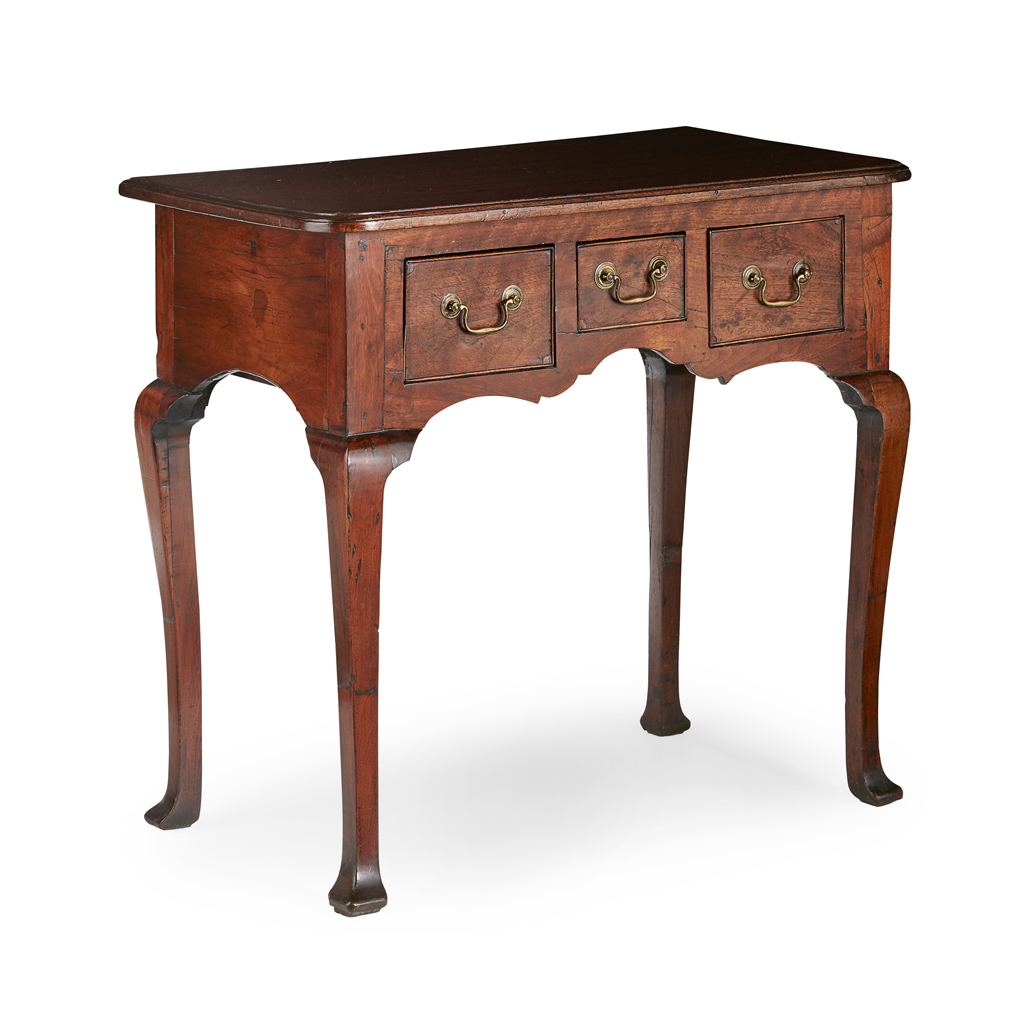 Appraisal: GEORGE III MAHOGANY LOWBOY TH CENTURY the rounded rectangular top