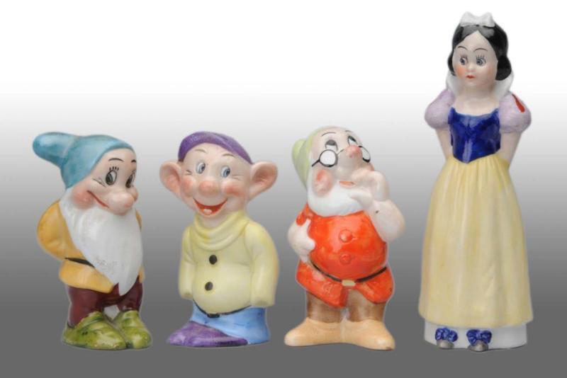 Appraisal: Lot of Snow White Dwarfs Toothbrush Holders Description Includes Snow