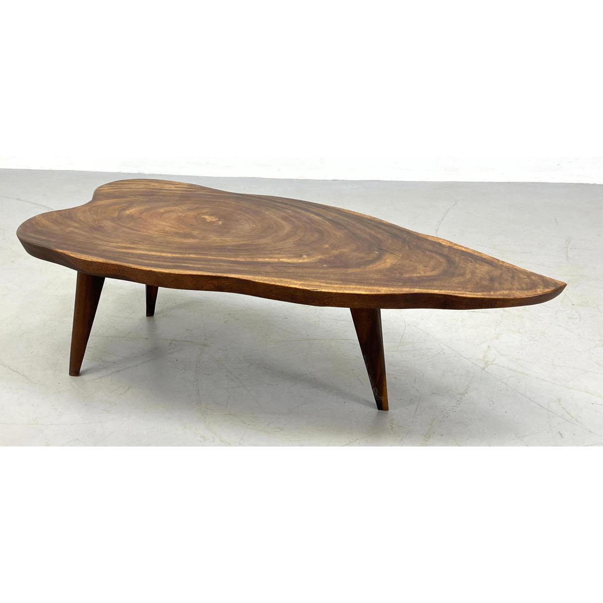 Appraisal: Thick Top Freeform Slab Coffee Table Leaf Form Angled legs