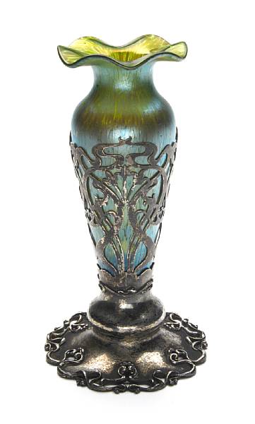 Appraisal: A Loetz iridescent glass vase with sterling silver frame circa