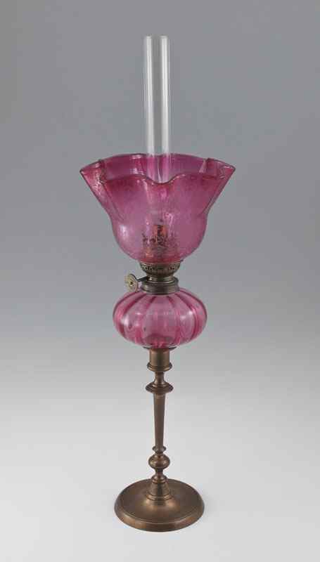 Appraisal: CRANBERRY GLASS PEG LAMP Cranberry glass font fits into the