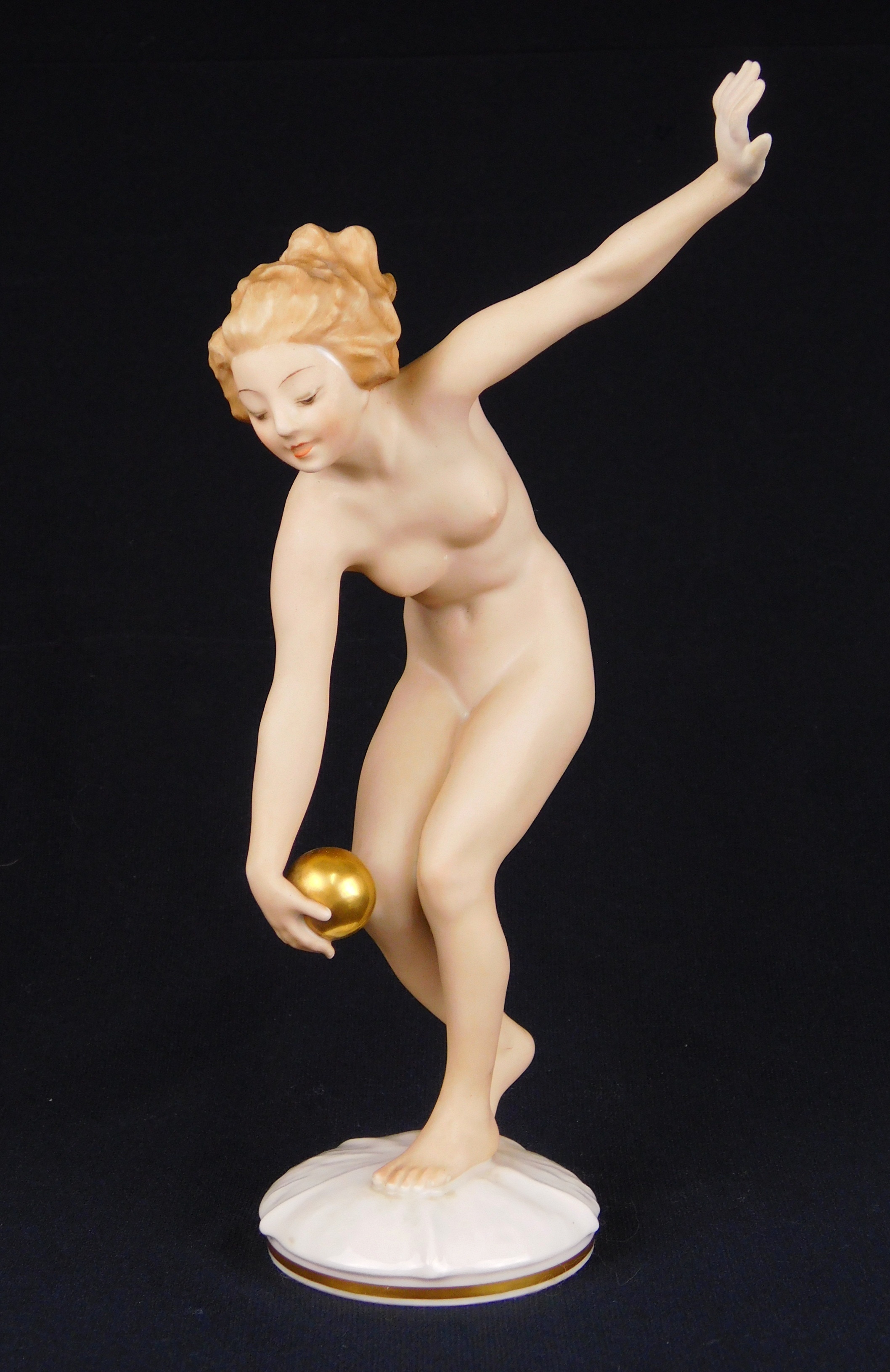 Appraisal: Hutschenreuther hand-painted porcelain figurine Nude with Gold Ball marked on