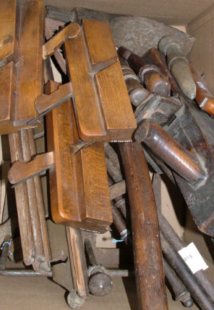 Appraisal: A collection of woodworking tools including two bow saws an