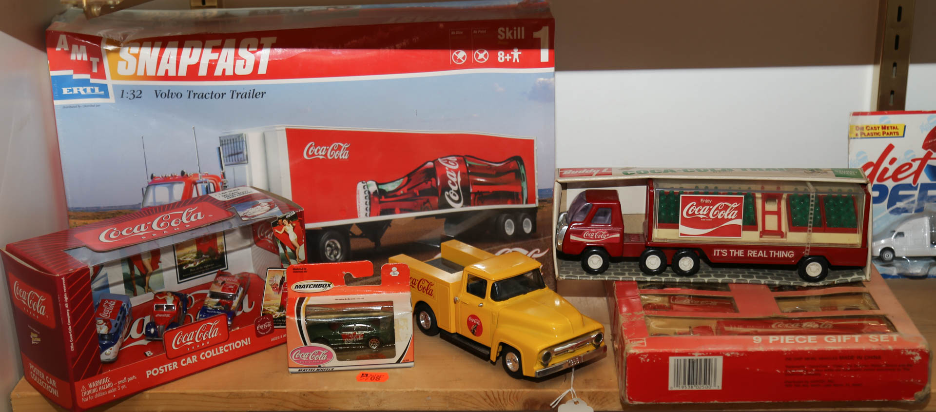 Appraisal: Shelf lot of Coca-Cola vehicles Undernumber