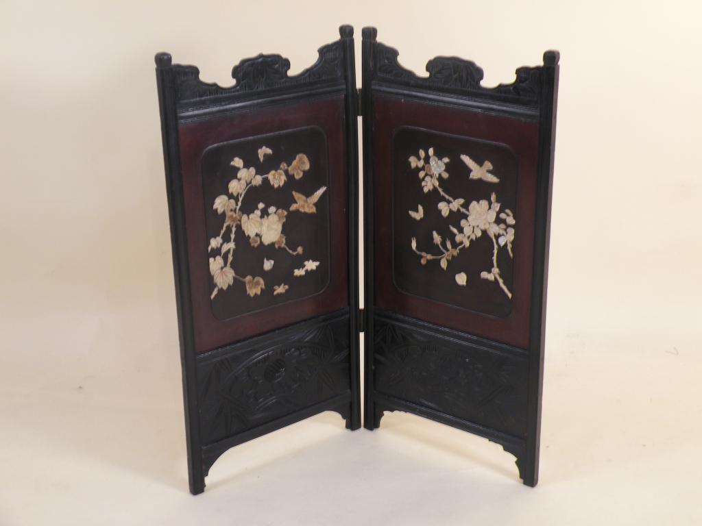 Appraisal: A late th early thC Japanese ebonised two fold screen