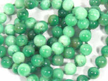 Appraisal: A jade bead necklace approx cm long the beads approx