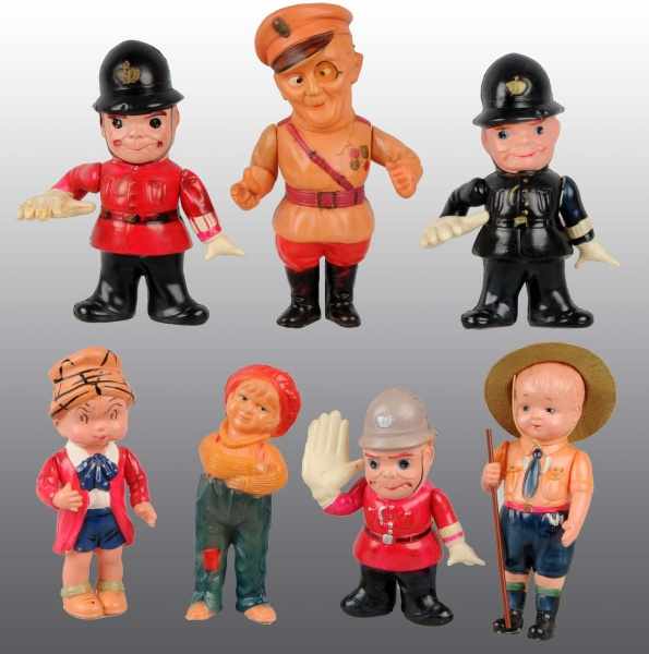 Appraisal: Lot of Celluloid Character Figures Description Includes three cops with