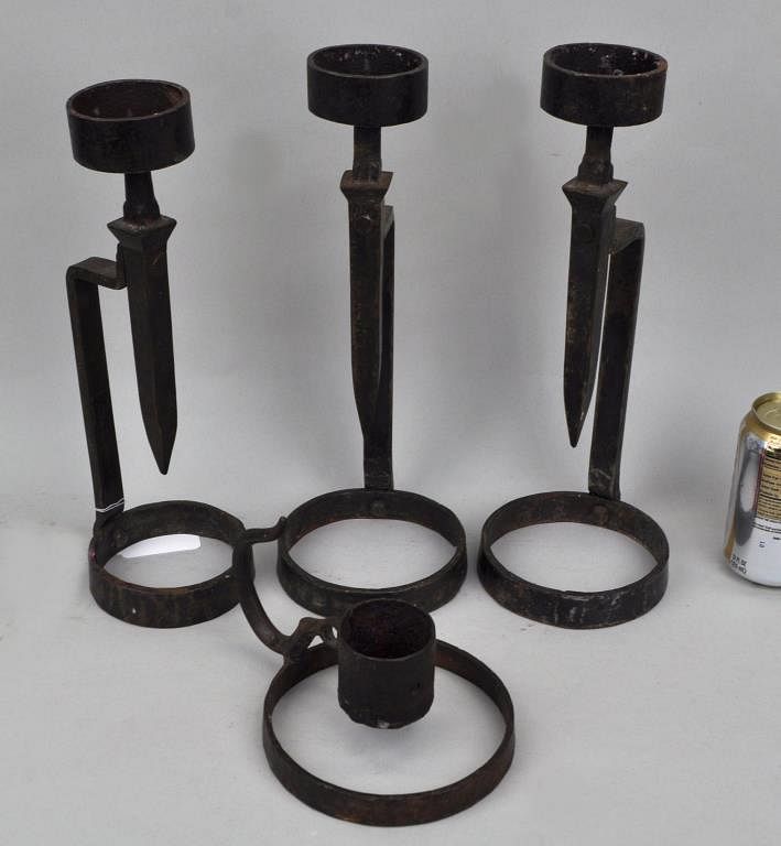 Appraisal: Four Brutalist Style Wrought Iron Candlesticks Largest high wide Use