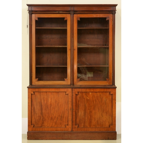 Appraisal: A Victorian mahogany bookcase the upper part fitted with adjustable