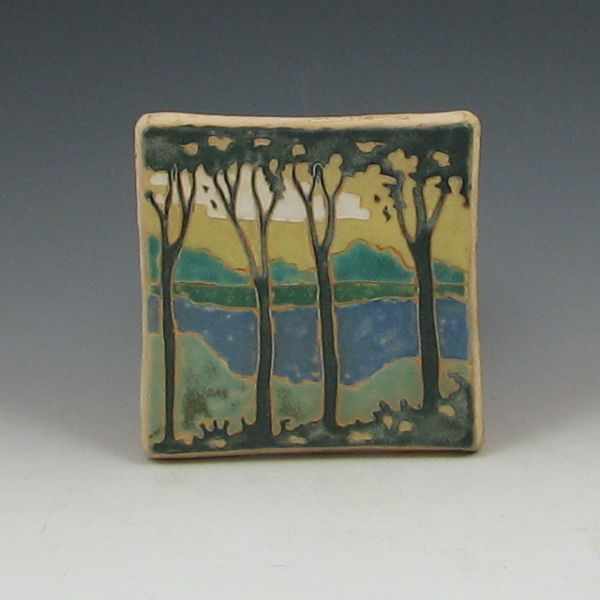 Appraisal: Trillium Tile studio tile of wooded mountain lake scene ''