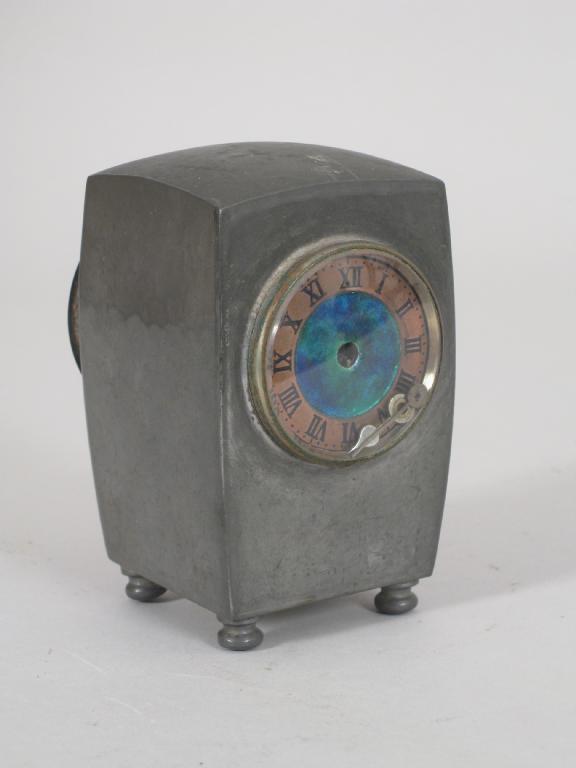 Appraisal: A Liberty and Co pewter Mantel Clock having circular enamel