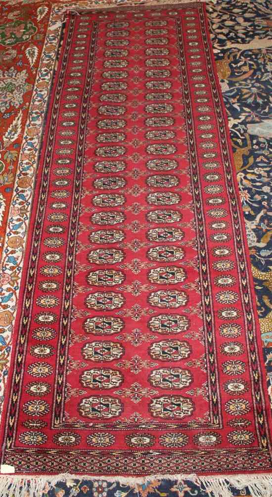 Appraisal: A Bokhara runner with field of forty eight polygons on