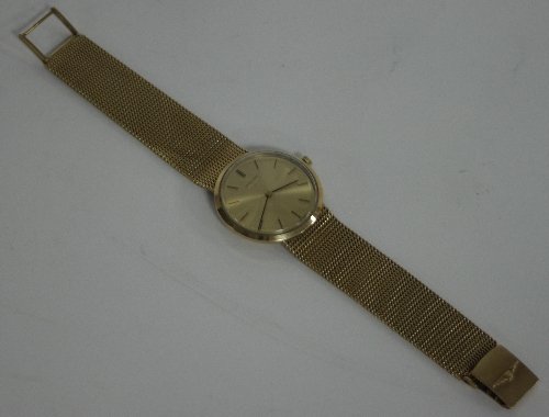 Appraisal: A Gentleman's ct gold Longines wristwatch the circular dial to