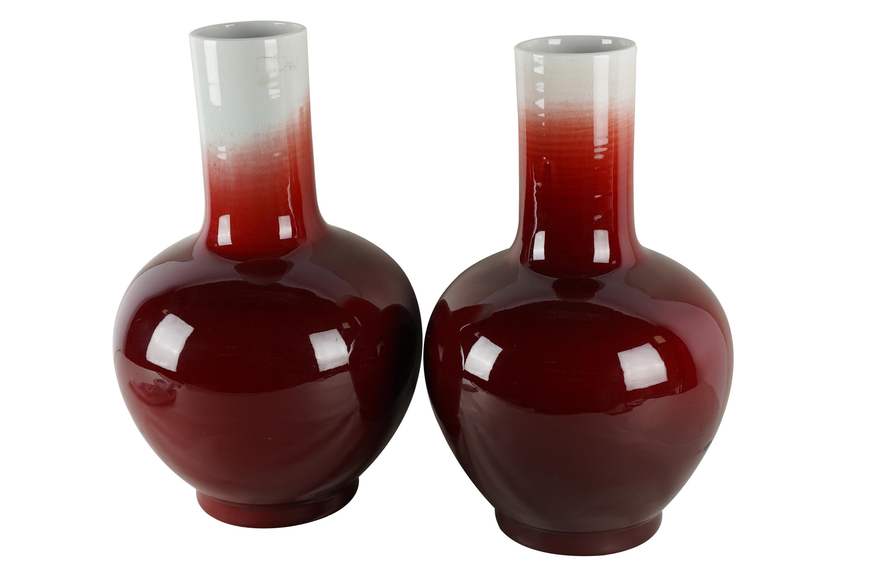 Appraisal: PAIR OF CHINESE OXBLOOD PORCELAIN VASES four-character mark Provenance The