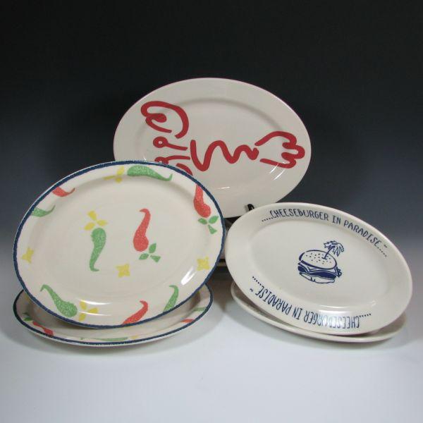 Appraisal: Seven Homer Laughlin oval serving plates including two Cheeseburger In