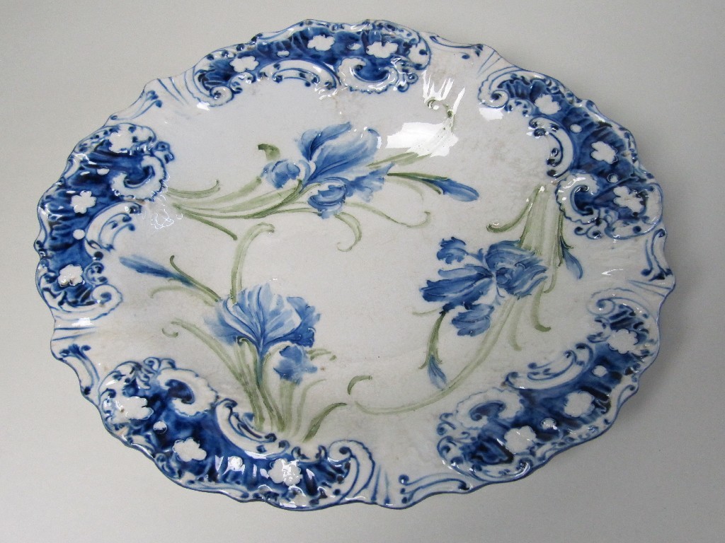 Appraisal: A Macintyre slipware dish decorated with irises in blue and