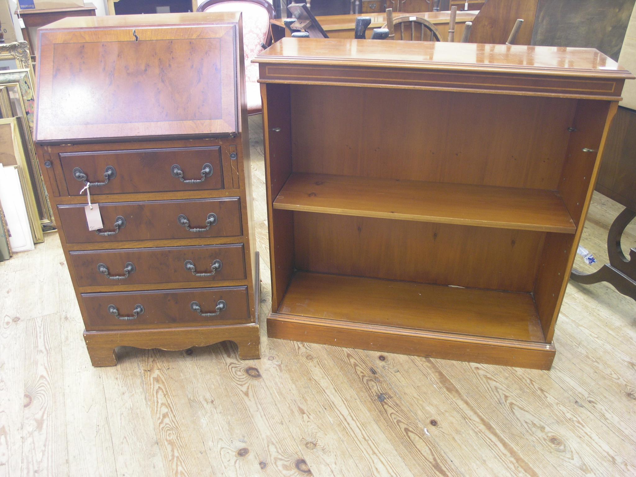 Appraisal: A reproduction yew-veneered lady's bureau cross-banded fall-front enclosing fittings four