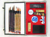 Appraisal: A Chinese boxed calligraphy set including ten brushes ink stick