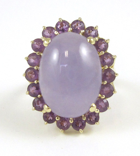 Appraisal: LAVENDER JADE AND AMETHYST RING k yellow gold with round-cut