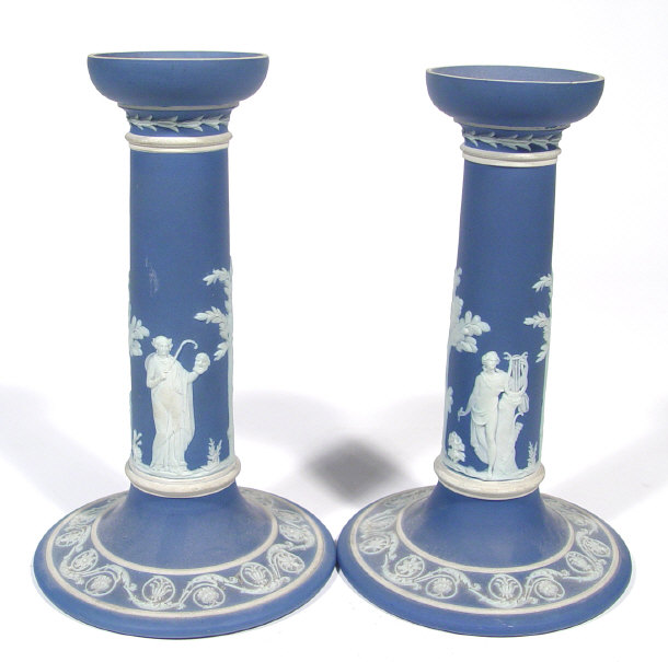 Appraisal: Pair of Wedgwood dark blue Jasperware candlesticks with white figural