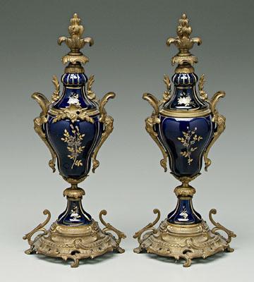 Appraisal: Pair ormolu mounted urns colbalt blue porcelain vases with gilt