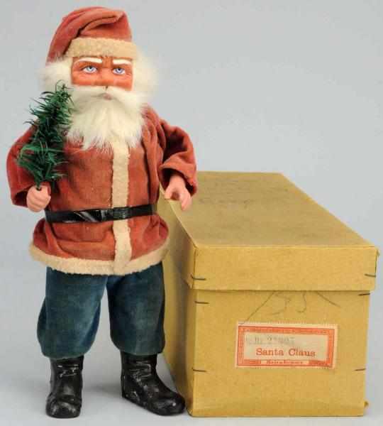 Appraisal: German Santa in Original Box Paper mache face composition branch