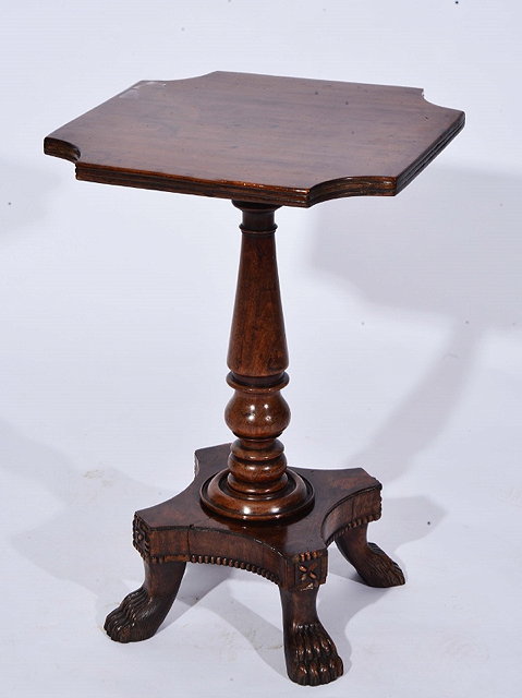 Appraisal: A MAHOGANY WINE TABLE with shaped top ring turned baluster