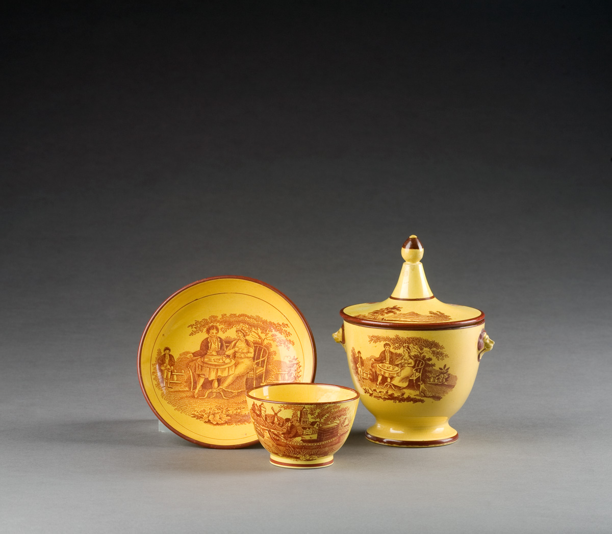 Appraisal: ENGLISH YELLOW-GLAZED RED TRANSFER-PRINTED SUGAR BOWL AND COVER AND A