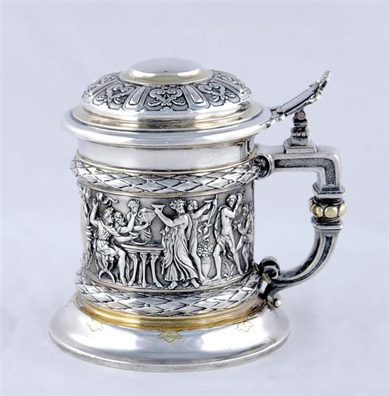 Appraisal: German silver covered tankard late th century chased domed cover