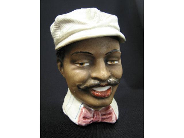 Appraisal: Victorian Figural Majolica Pottery Tobacco Jar black man with mustache