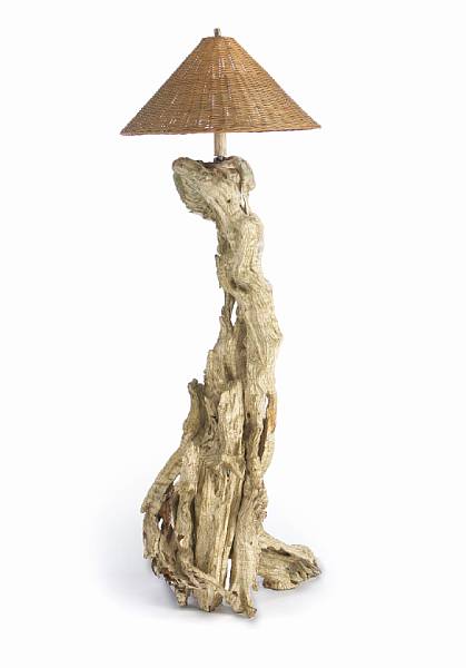 Appraisal: A white-painted driftwood floor lamp late th century has wicker