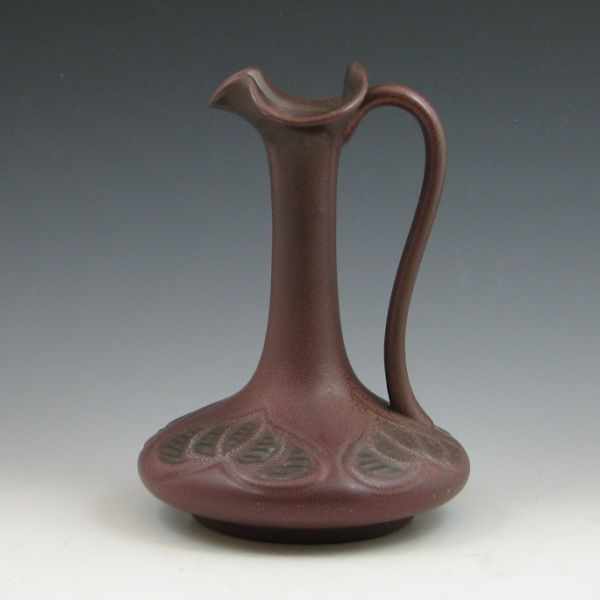 Appraisal: Weller Fru Russet trefoil ewer in mottled mauve matte glaze