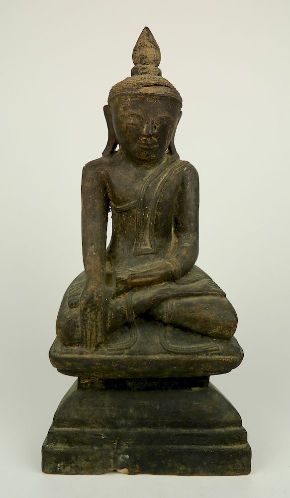 Appraisal: Carved and gilded wood Buddha th thc Carved and gilded